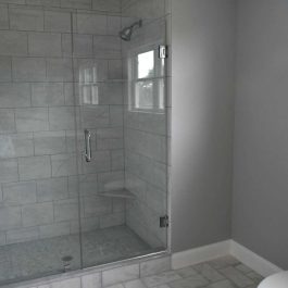 bathroom-with-glass-shower-door-white-toilet